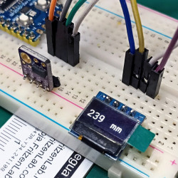 Laserowy czujnik odległości z wyświetlaczem OLED i RP2040